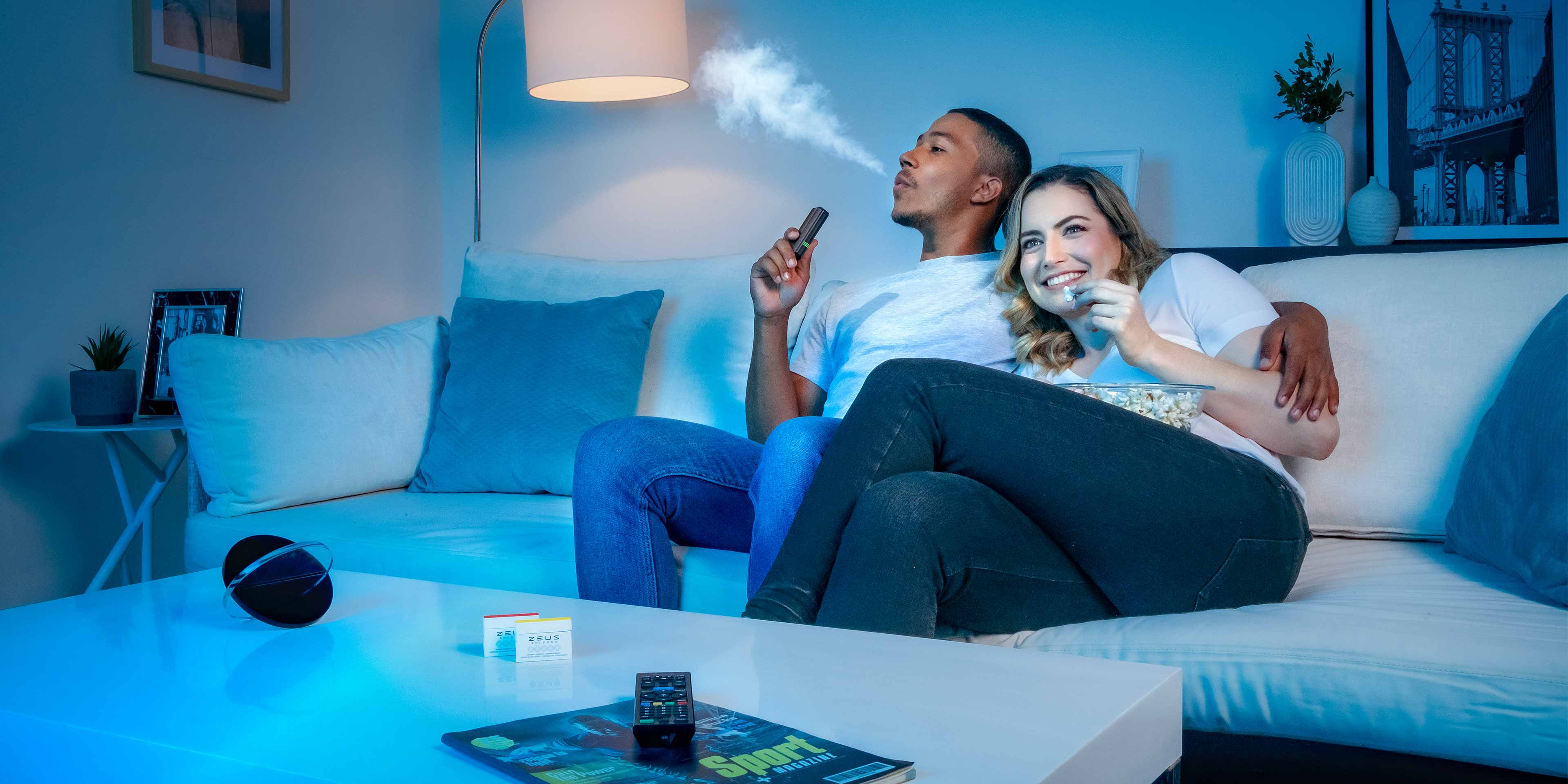 A couple enjoys their Zeus Arc S while binging their favorite show on Netflix.